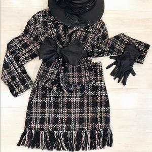 Herringstone black tweed with pinks and white suit.